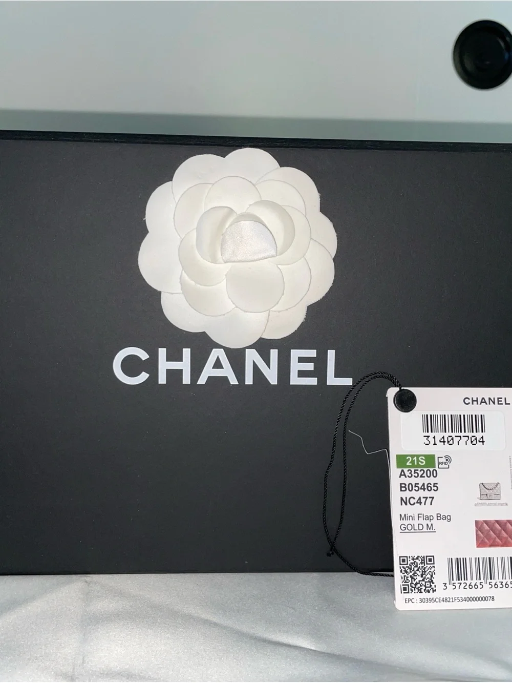 CHANEL Quilted Mini Flap Bag in Metallic Rose